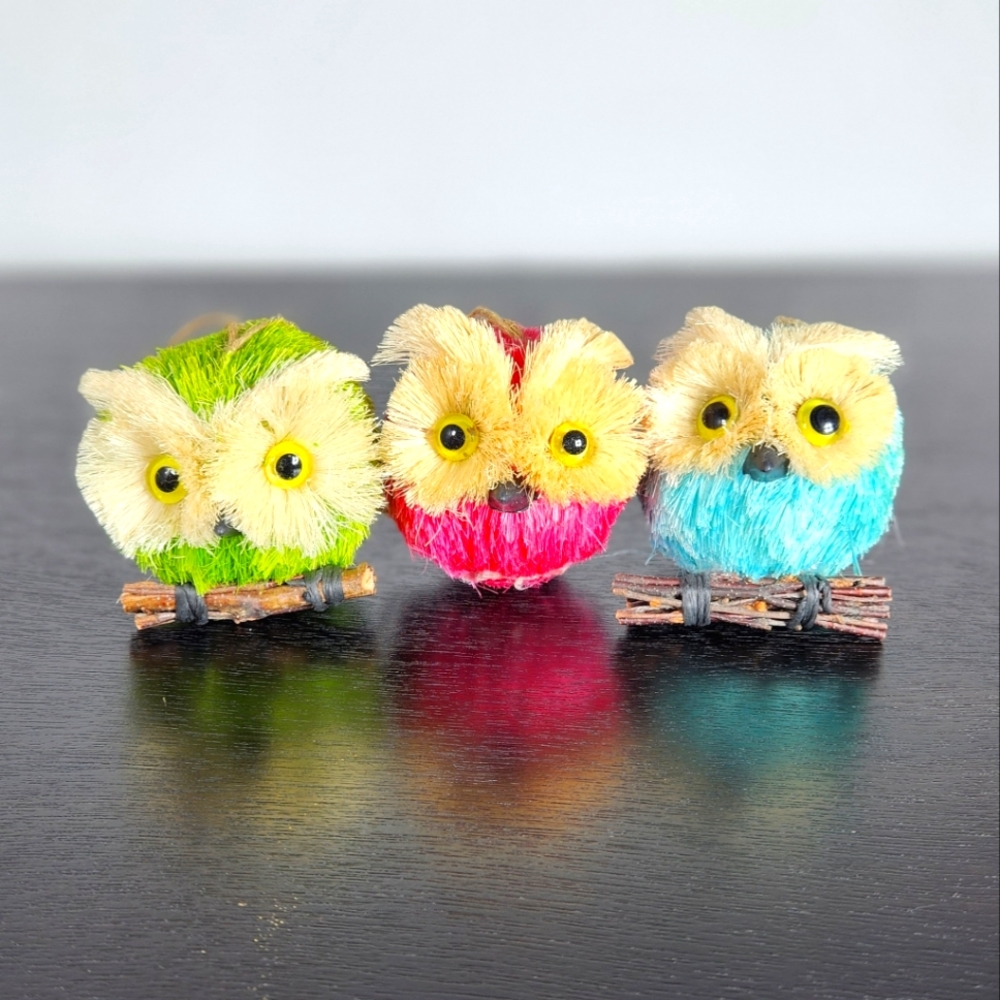 3 owl figures/ornaments. Green, pink teal